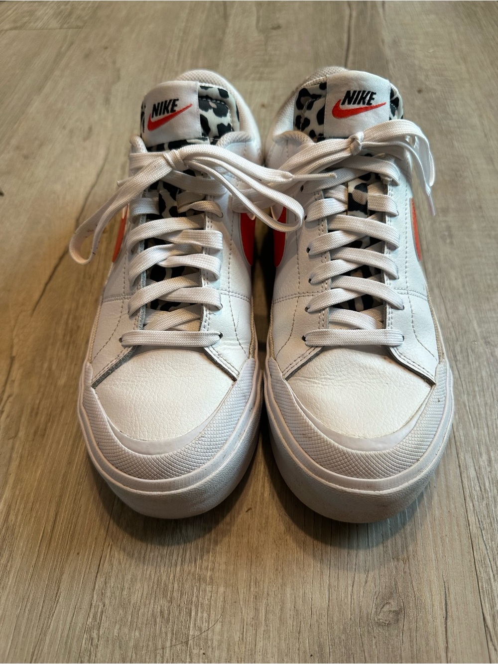 Nike women’s White Sneakers with Orange Swoosh